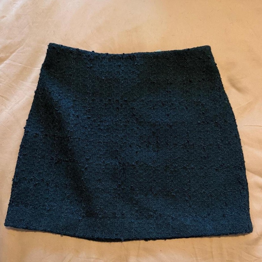 H&M black mini skirt with textured finish